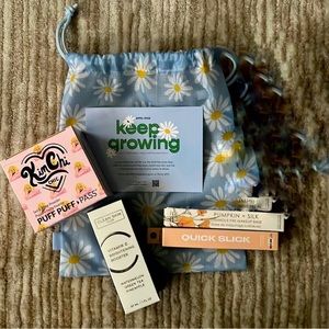IPSY Bag. Includes vitamin c, primer, powder, and quick slick.